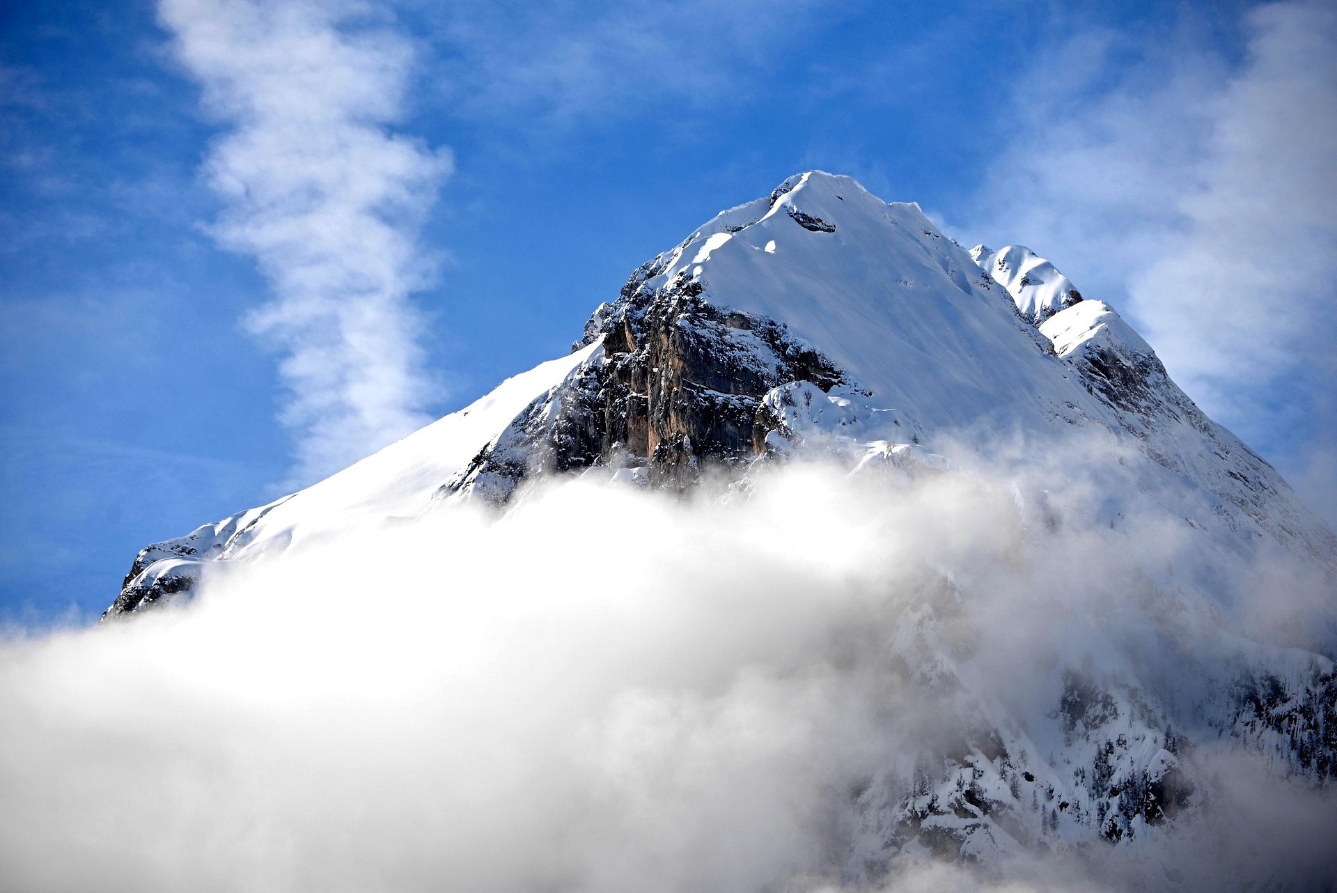 Snow-capped Peak Among the Clouds