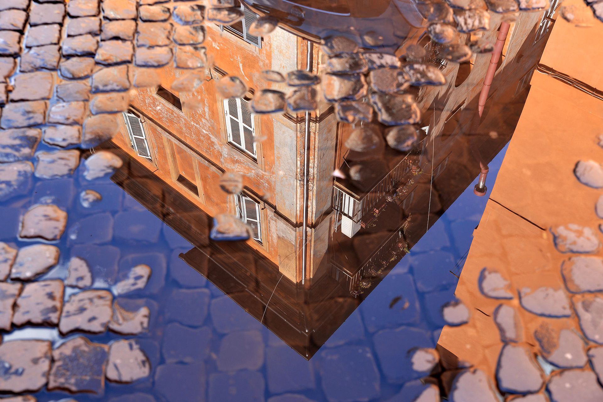 Palace reflected on pebbles