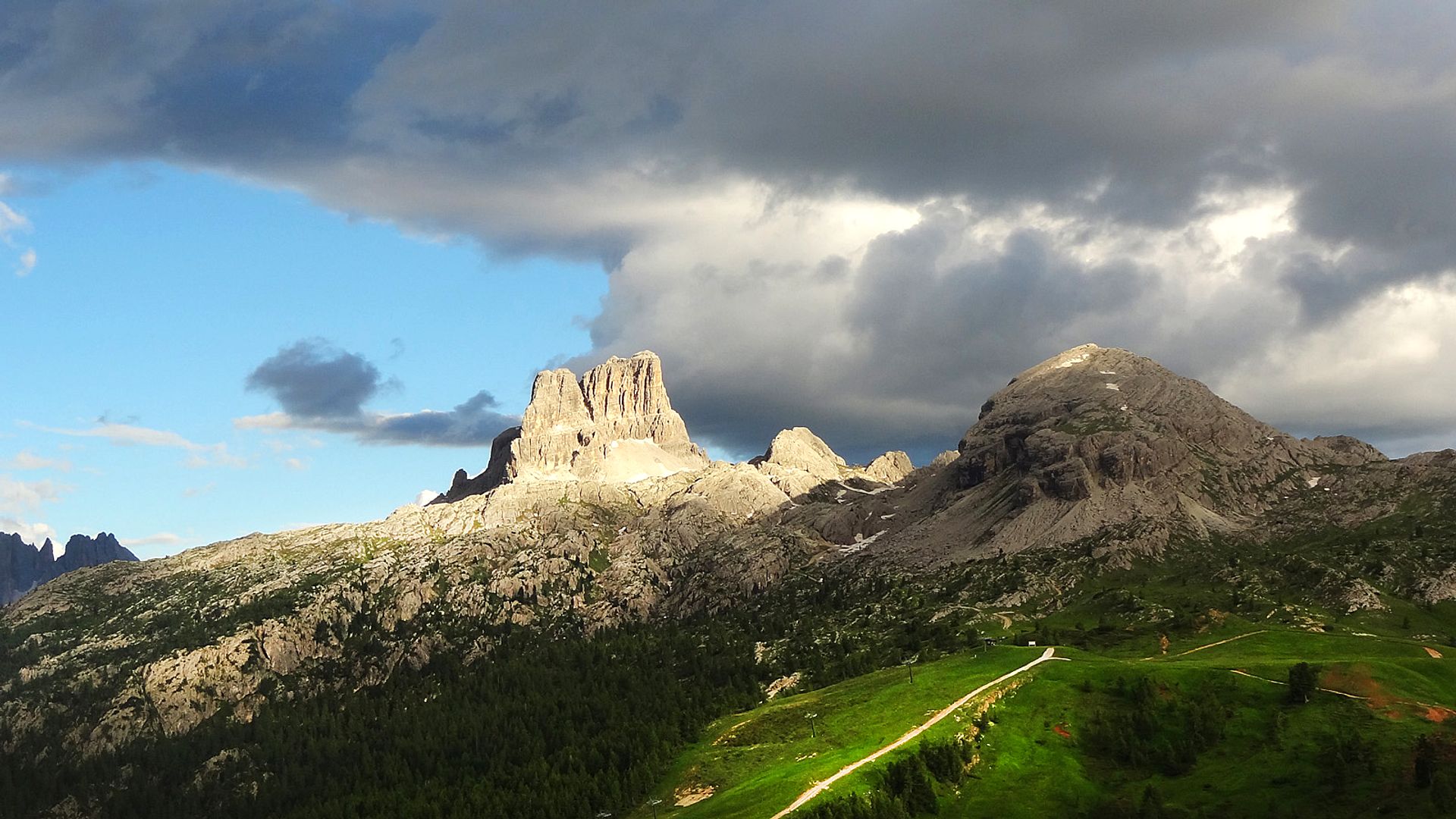 Dolomite mountains and cloudy skies