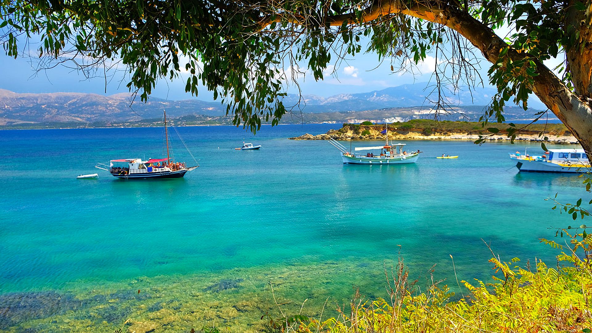 Boats in a crystal clear bay