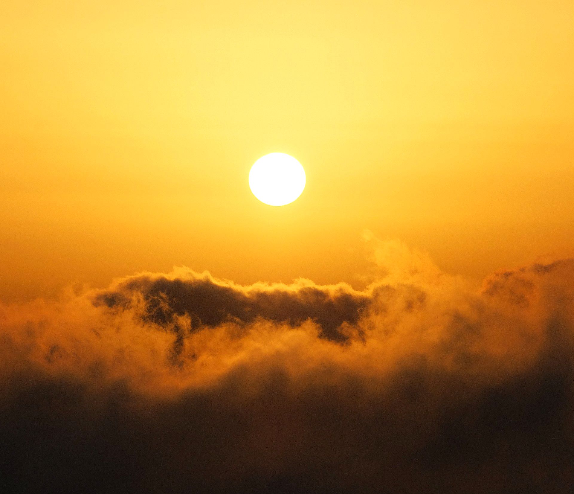 Golden sun above the clouds