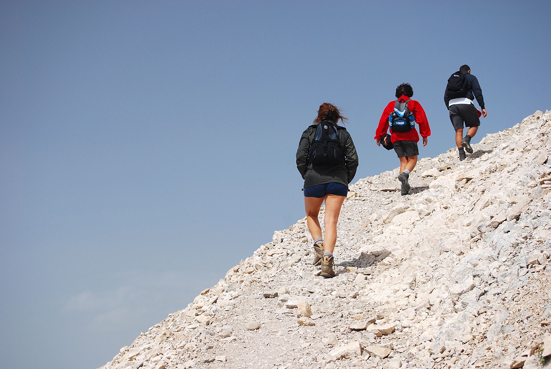 Hikers on a steep trail