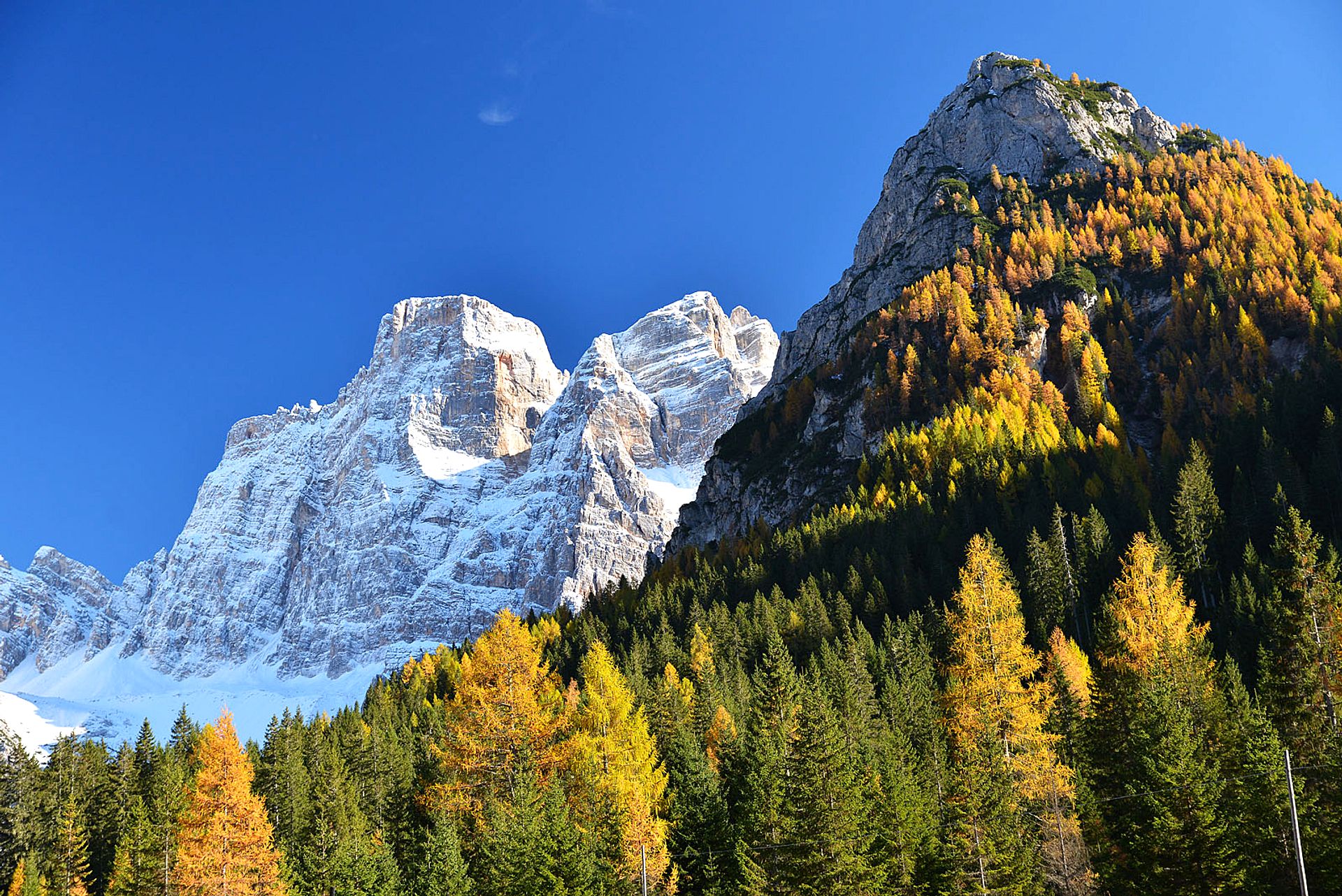 Snow-capped mountains and autumn colors