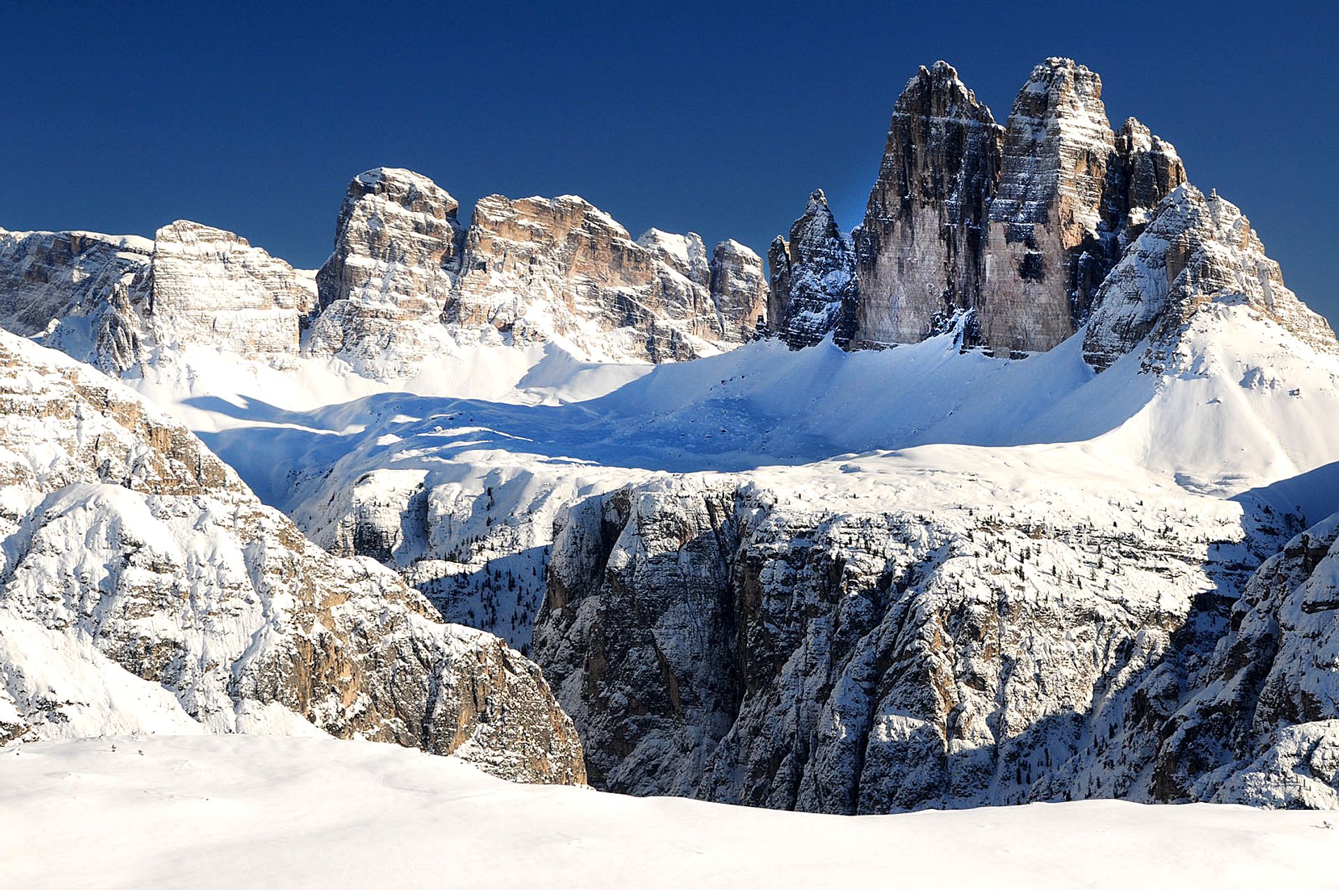 The Three Snow-Capped Peaks