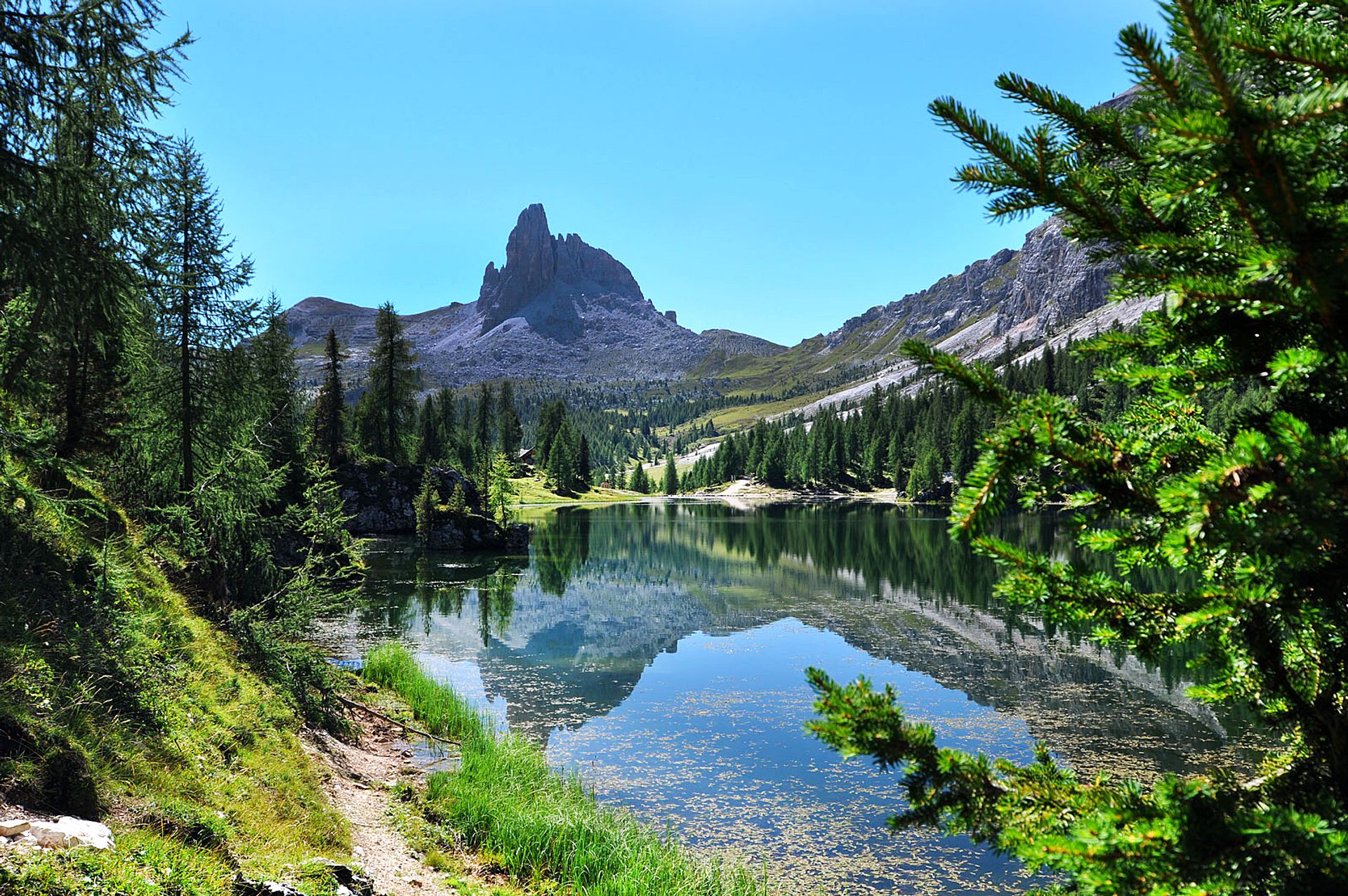 Alpine lake with peak