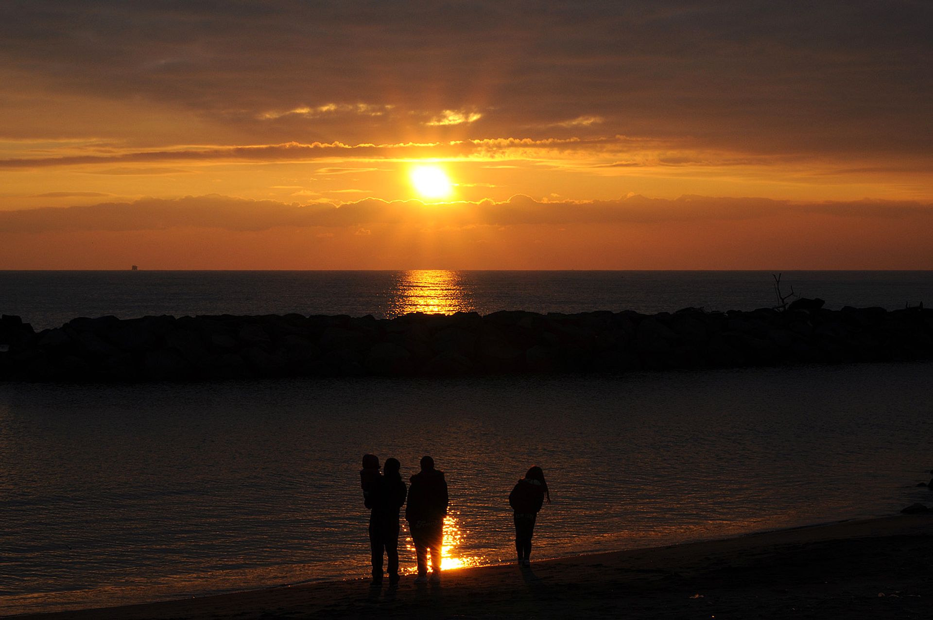 Sunset on the beach with the family