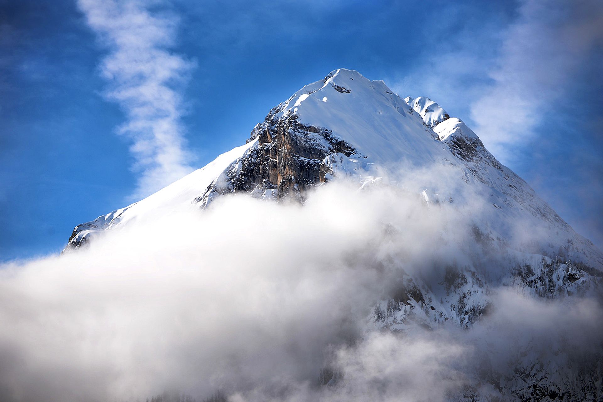 Snow-capped peak among the clouds