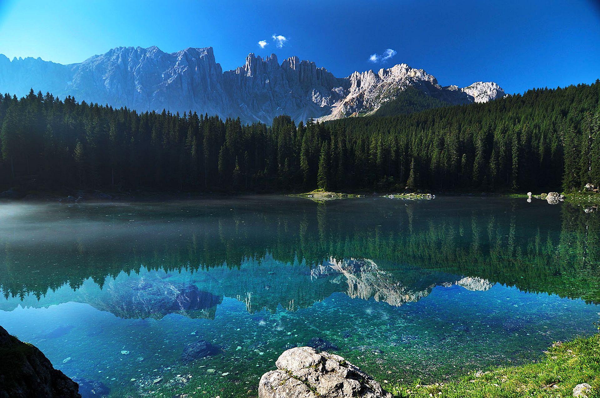 Alpine lake and Dolomites of Carezza